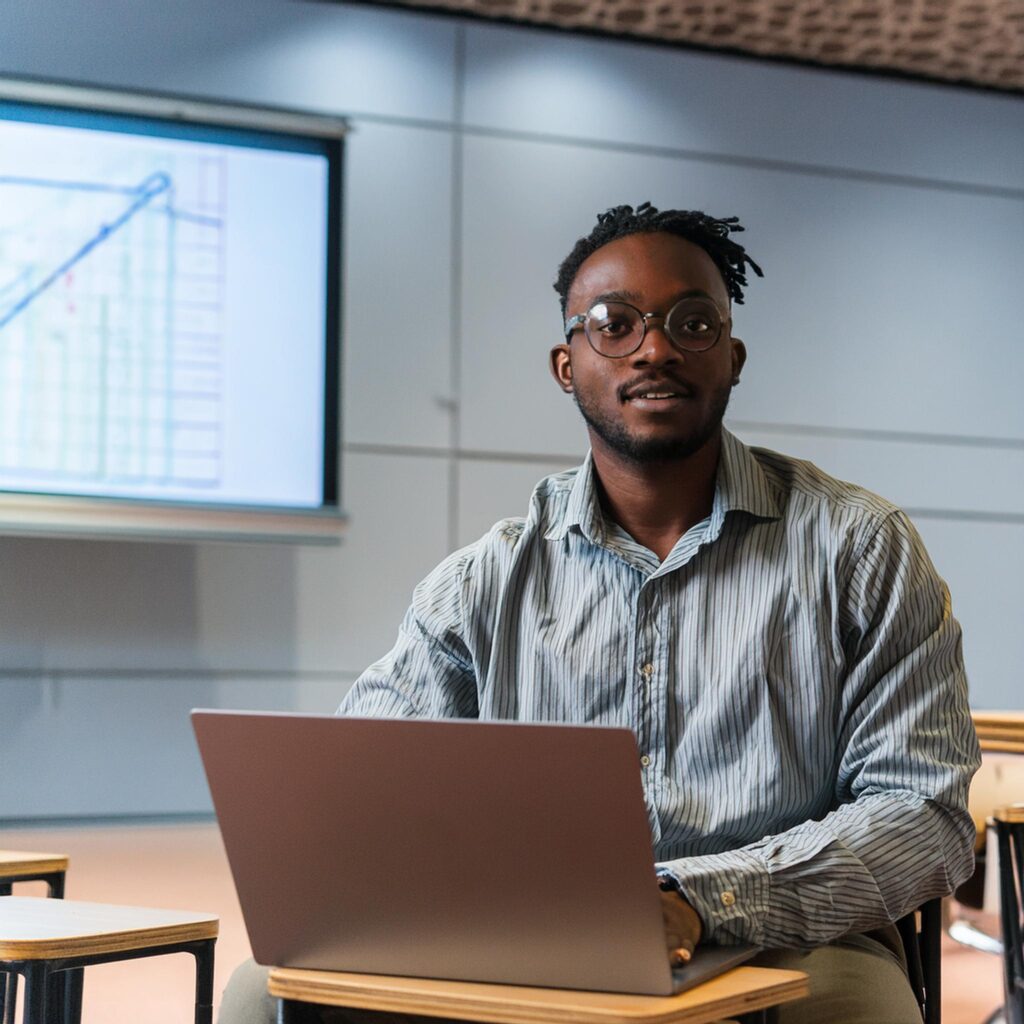 Firefly photograph of a person on a laptop attending a presentation 17423